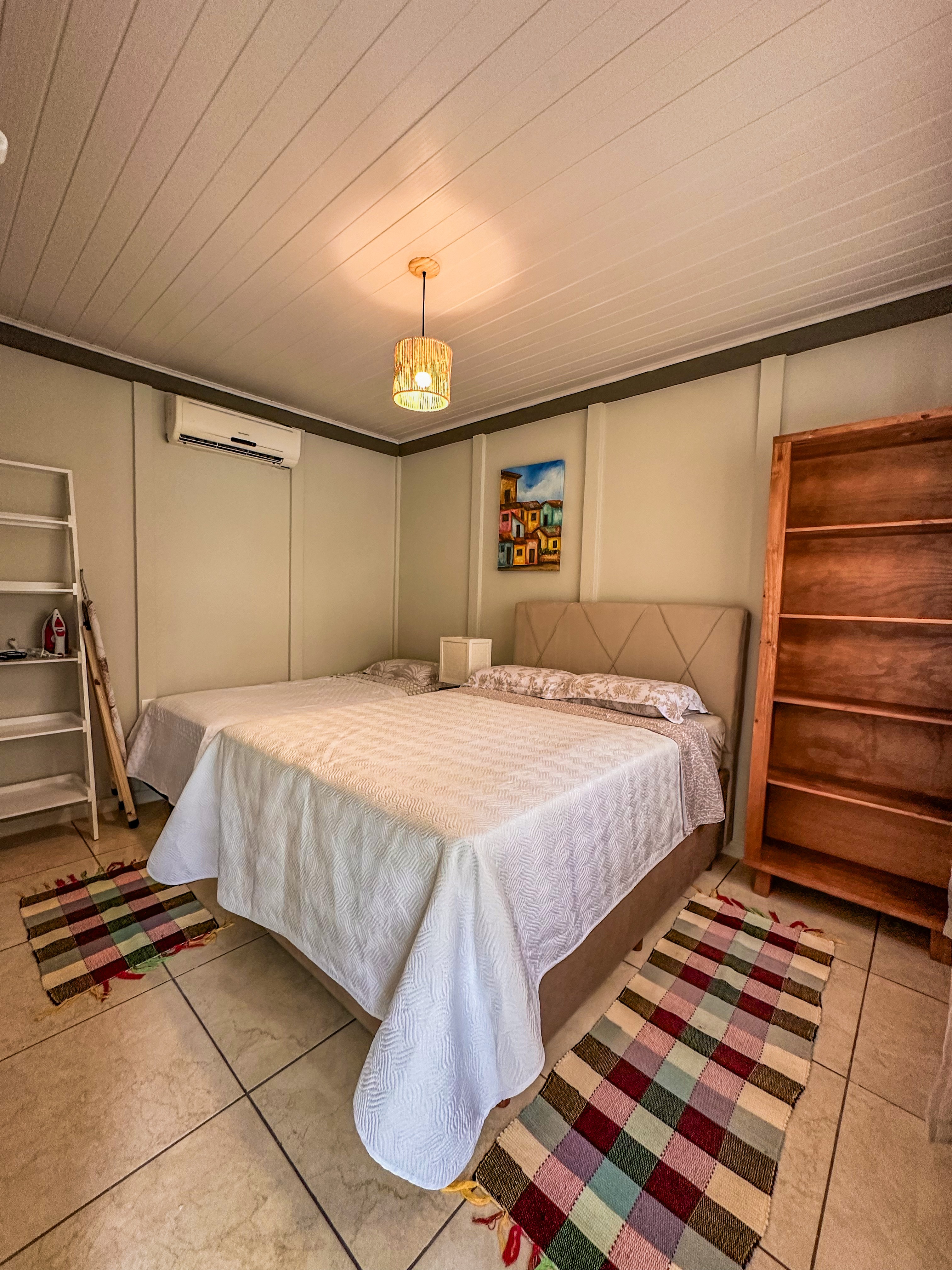 Quarto principal com ar-condicionado